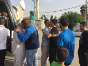 بالصور: عودة معتمري اللد والرملة إلى ديارهم سالمين 